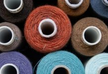 Colorful spools of sewing thread