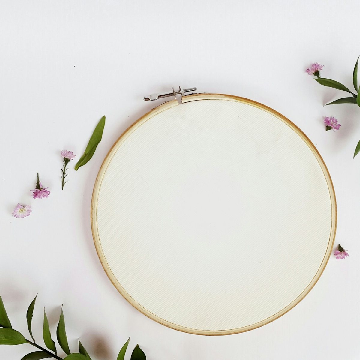 Embroidery hoop with fabric