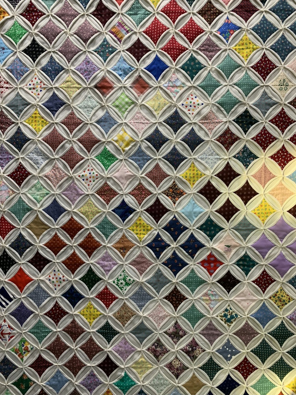 Colorful quilt made from cut fabric pieces