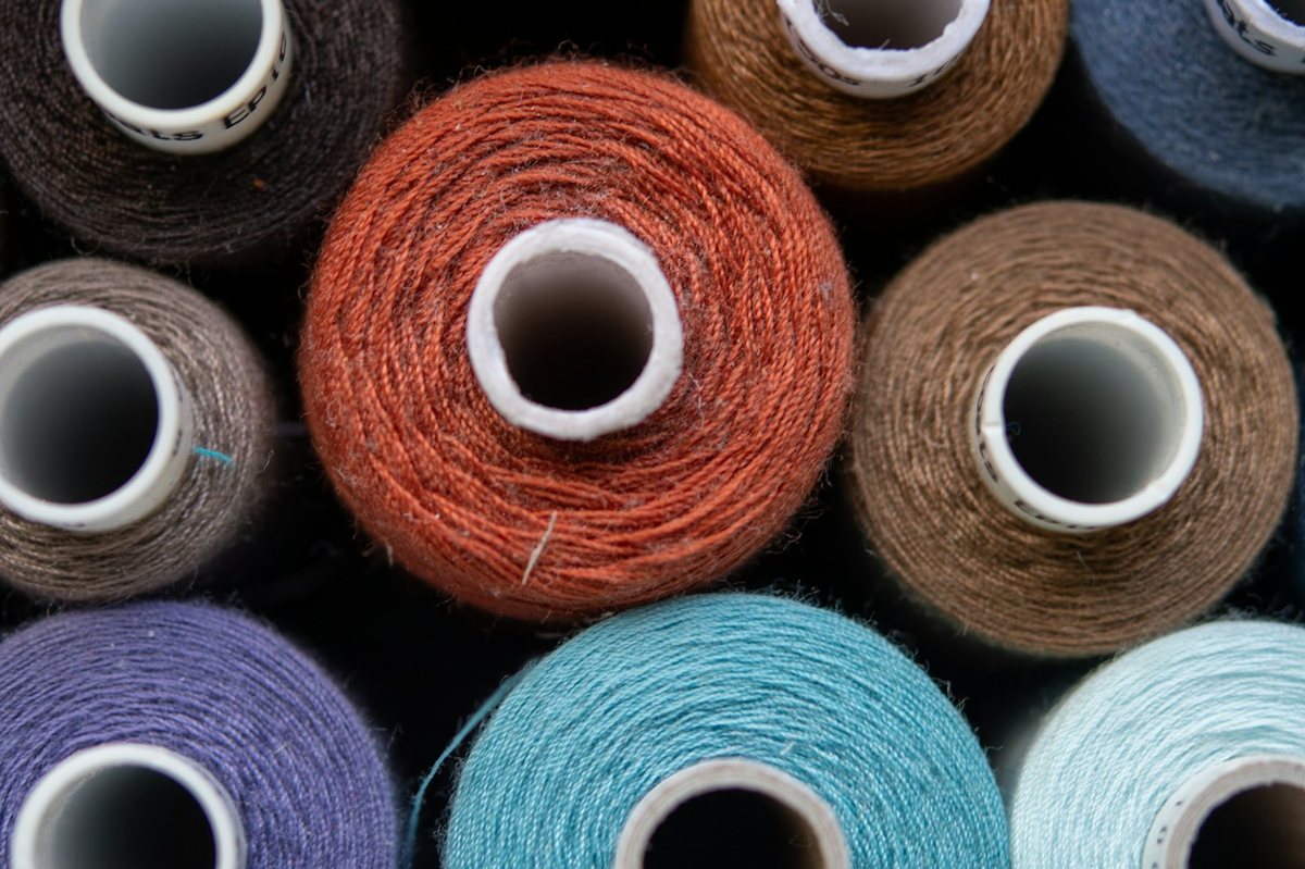 Colorful spools of sewing thread
